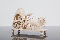 Lot 47 - INDIAN IVORY CARVING modelled as a figure in...