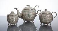 Lot 140A - INDIAN SILVER THREE PIECE TEA SERVICE...