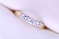 Lot 1870 - DIAMOND FIVE STONE RING set with five...