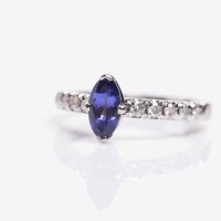 Lot 1892A - TANZANITE AND DIAMOND RING the marquise shaped...