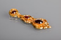Lot 1164 - VICTORIAN GARNET PENDANT of scrolling and...