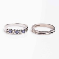 Lot 1893A - TANZANITE AND DIAMOND FIVE STONE RING set with...