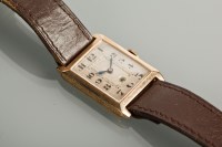 Lot 1006 - GENTLEMAN'S NINE CARAT GOLD ART DECO WRIST...