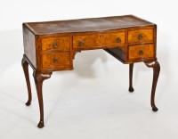 Lot 456 - 1920'S SERPENTINE WALNUT DESK with five...
