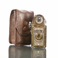 Lot 261 - CORONET MIDGET 16 MM CAMERA in mottled green...