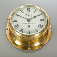 Lot 273 - BRASS SHIPS BULKHEAD CLOCK makers Dobbie...