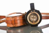 Lot 307 - EARLY 20TH CENTURY PRISMATIC COMPASS in a tan...