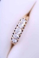 Lot 1921 - VICTORIAN DIAMOND FIVE STONE RING the old cut...