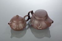 Lot 107 - TWO CHINESE YI XING TEA POTS both of circular...