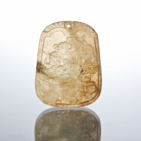 Lot 115 - CHINESE CELADON JADE PENDANT modelled on one...