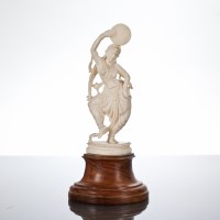 Lot 129 - INDIAN IVORY CARVING of a standing female,...