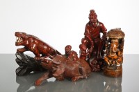 Lot 171 - THREE CHINESE WOOD CARVINGS of a fisherman,...