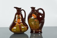 Lot 134 - TWO ROYAL DOULTON DEWAR'S WHISKEY JUGS...