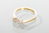 Lot 1963A - DIAMOND THREE STONE RING the brilliant cut...