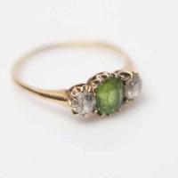 Lot 1965A - EMERALD AND DIAMOND THREE STONE RING the...