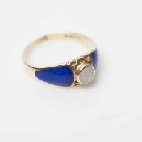 Lot 1970A - OPAL AND ENAMEL DRESS RING with a central...