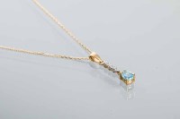 Lot 1973A - TOPAZ AND DIAMOND PENDANT with a pear shaped...