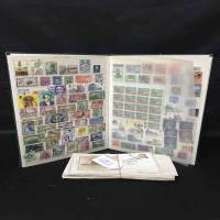 Lot 419 - ALBUM OF WORLD STAMPS a sixteen page stockbook...