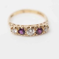 Lot 1980A - RUBY AND DIAMOND FIVE STONE RING set with...