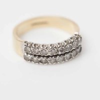 Lot 1987 - DIAMOND CLUSTER RING set with two rows of...