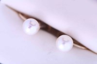 Lot 1999A - PAIR OF PEARL STUD EARRINGS each set with a...