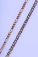 Lot 2010 - THREE GOLD CHAINS each marked for nine carat...