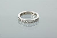 Lot 1102 - DIAMOND FULL ETERNITY RING channel set with...