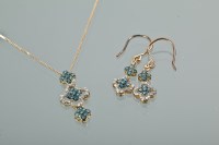 Lot 1123 - BLUE AND WHITE DIAMOND PENDANT AND EARRING SET...