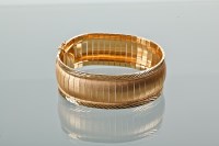 Lot 1135 - FINE EIGHTEEN CARAT GOLD BRACELET with brushed...