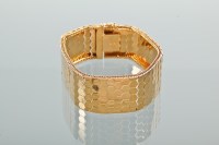 Lot 1140 - EIGHTEEN CARAT GOLD BRACELET each link with a...