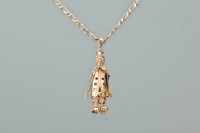 Lot 1153 - CLOWN MOTIF PENDANT the clown's jacket set...