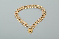 Lot 1167 - CURB LINK CHAIN BRACELET with an ornate...