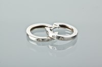 Lot 1169 - PAIR OF DIAMOND SET HOOP EARRINGS each with...