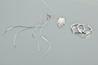 Lot 1173 - NINE CARAT GOLD DIAMOND SET PENDANT NECKLACE...