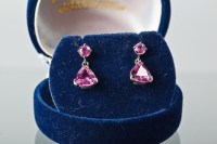 Lot 1209 - PAIR OF PINK GEM SET EARRINGS each set with a...