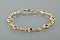 Lot 1211 - SAPPHIRE SET BRACELET set with round sapphires,...
