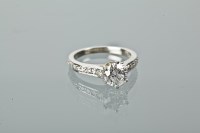 Lot 1215 - DIAMOND SOLITAIRE RING the brilliant cut...