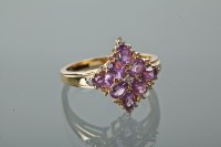 Lot 1224 - AMETHYST DRESS RING the marquise shaped bezel...