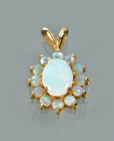 Lot 1225 - OPAL PENDANT the central oval opal 8x6mm...