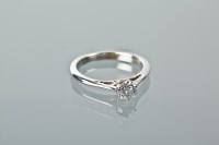 Lot 1242 - DIAMOND SOLITAIRE RING the brilliant cut...