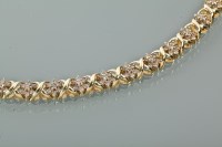 Lot 1245 - DIAMOND SET BRACELET set with clusters of...