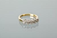 Lot 1246 - DIAMOND FIVE STONE RING the brilliant cut...