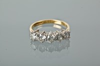 Lot 1247 - DIAMOND FIVE STONE RING the brilliant cut...