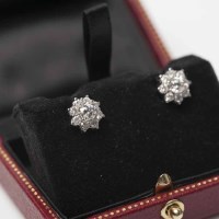 Lot 2029A - PAIR OF DIAMOND CLUSTER EARRINGS each formed...