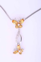 Lot 2038 - YELLOW SAPPHIRE AND DIAMOND BUTTERFLY PENDANT...