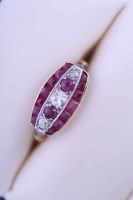 Lot 2047 - ART DECO RUBY AND DIAMOND RING the oval bezel...