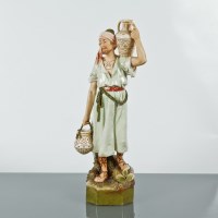 Lot 204 - ROYAL DUX PORCELAIN FIGURE OF A NUBIAN WATER...