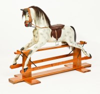 Lot 284 - HADDON DAPPLE GREY PEDESTAL ROCKING HORSE on...