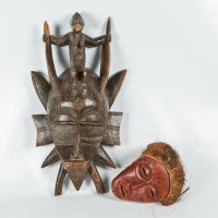 Lot 292 - TWO GHANA CARVED WOOD TRIBAL MASKS the first...