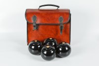Lot 310 - SLAZENGER WALNUT SET OF FOUR BOWLING BALL in a...